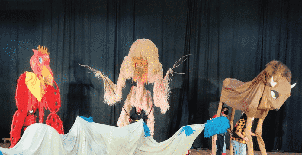 Trickster play with bird costume and two other animals